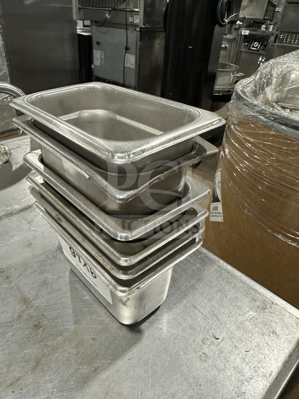 Den commercial stainless-steel food/sauce tray set, stack of six, durable, restaurant quality, excellent condition.