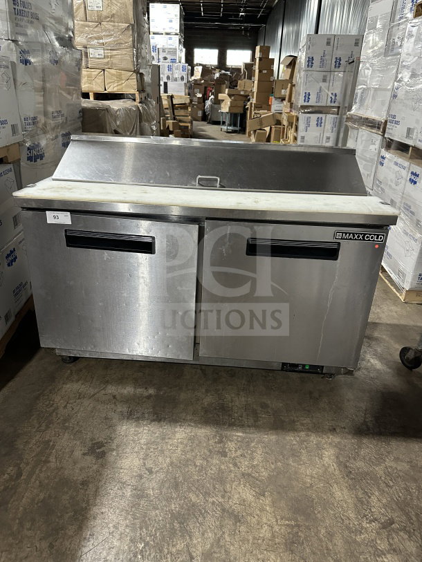 Maxx Cold MXCR60SHC commercial 2-door refrigerated prep table, stainless steel, with poly-coated wire rack, on casters.