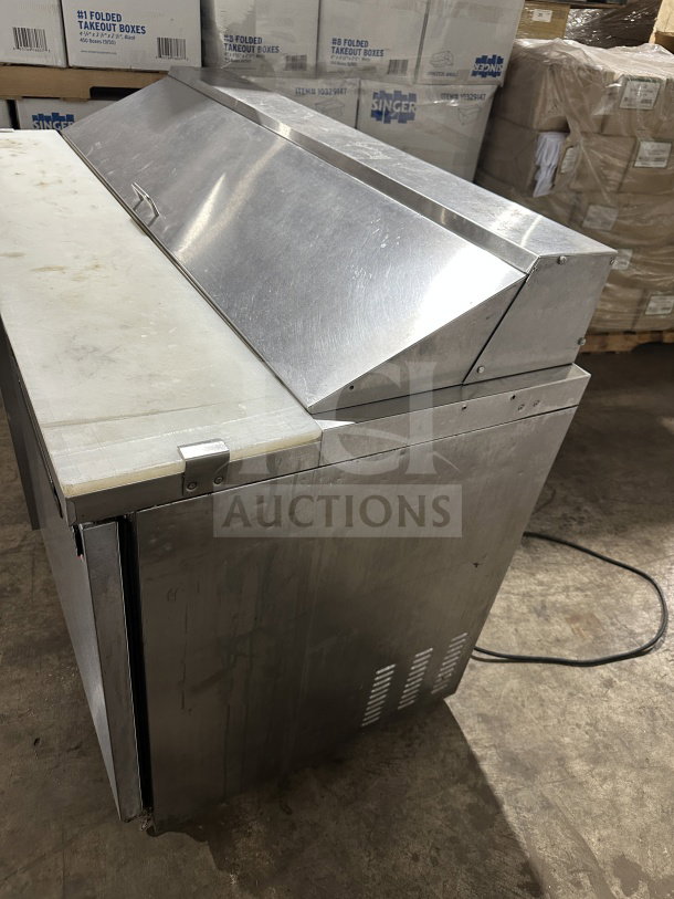 Maxx Cold 2-door stainless steel refrigerated prep table, model MXCR60SHC, with poly-coated rack and casters.