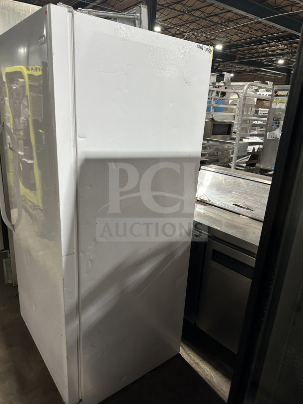 Frigidaire Electrolux upright freezer, model FFFH20F2QWC, white, Energy Star certified, single door, poly-coated wire rack.