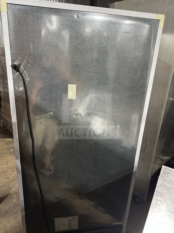Electrolux Frigidaire commercial upright freezer, model FFFH20F2QWC, with energy-efficient design and poly-coated wire rack.