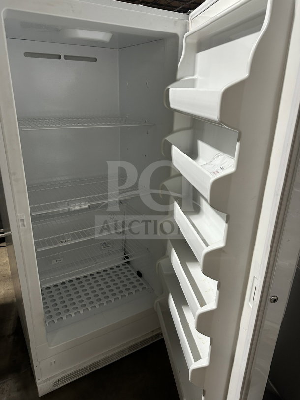 Electrolux Frigidaire FFFH20F2QWC upright freezer, single door, Energy Star rated, white, poly-coated wire rack shelving.