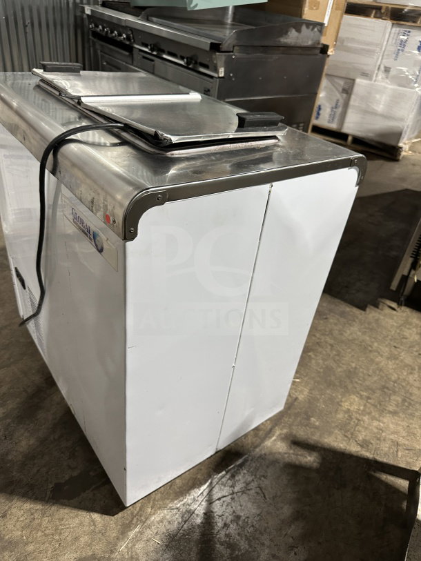 Global commercial white electric ice cream dipping cabinet with stainless steel tops, visible branding, in good condition.