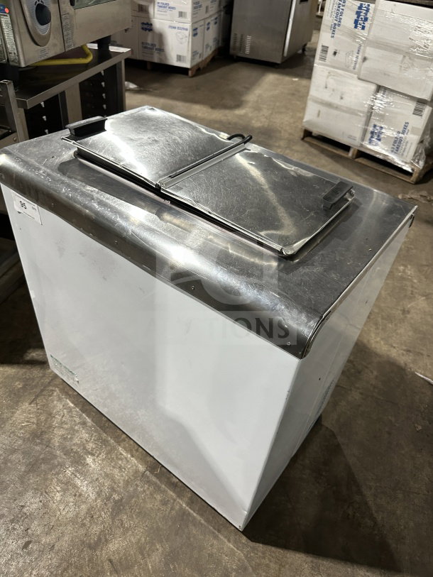 Global Commercial white electric ice cream dipping cabinet with stainless steel lid, used condition, model unknown.