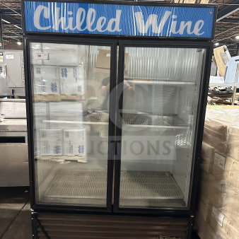 True Commercial Reach-In Double Glass Door Merchandiser Refrigerator, Model GDM-49, poly-coated racks, on casters, 115V, 1 phase.