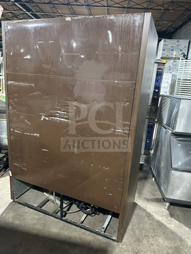 True GDM-49 commercial double glass door refrigerator, poly-coated racks, 115V, 1 phase, on casters, used condition.