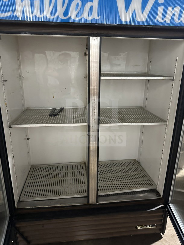 True GDM-49 commercial reach-in refrigerator, double glass doors, poly coated racks, on casters, 115V, SN: 1-730276.