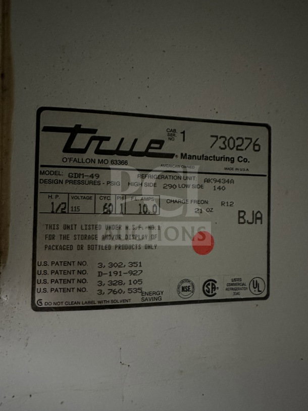 True GDM-49 commercial refrigerator label, model and serial number detailed, 115V, 1 Phase, NSF listed.