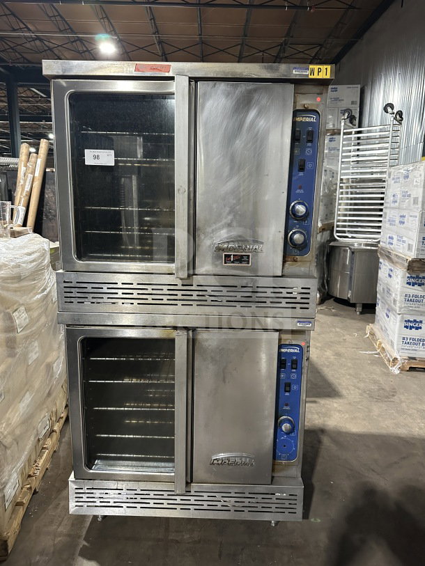 Imperial commercial stainless steel double-stacked gas convection oven, wired rack, on casters, with visible Imperial logo and control panel.