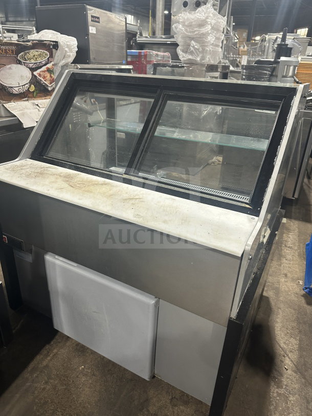 Senkar NETA4FT refrigerated bakery display case, black base, sliding door, multi-tier, clear glass, no compressor, used.