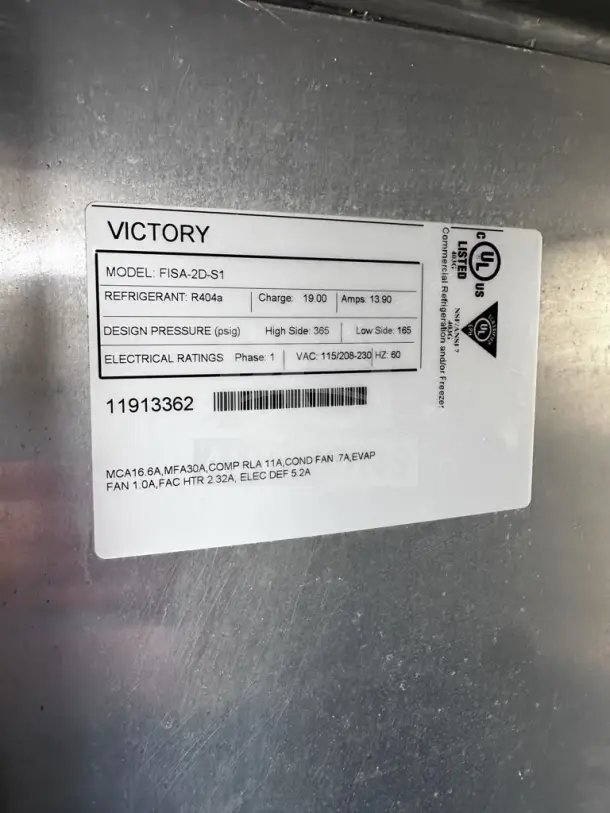 Victory FISA-2D-S1 commercial roll-in freezer label showing model, refrigerant details, and electrical ratings.