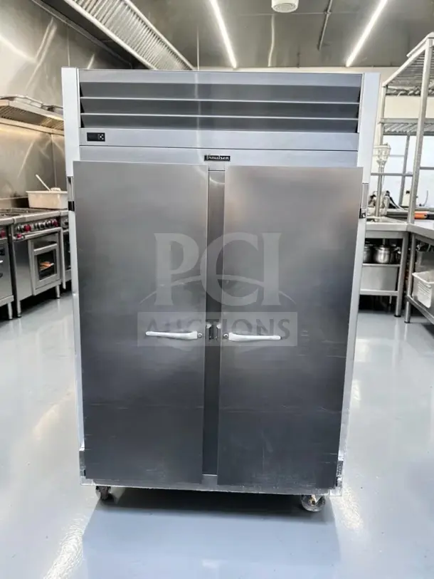 Traulsen G20010 two-section commercial refrigerator, 52.13", 46 cu. ft., stainless steel, excellent condition, 115V.