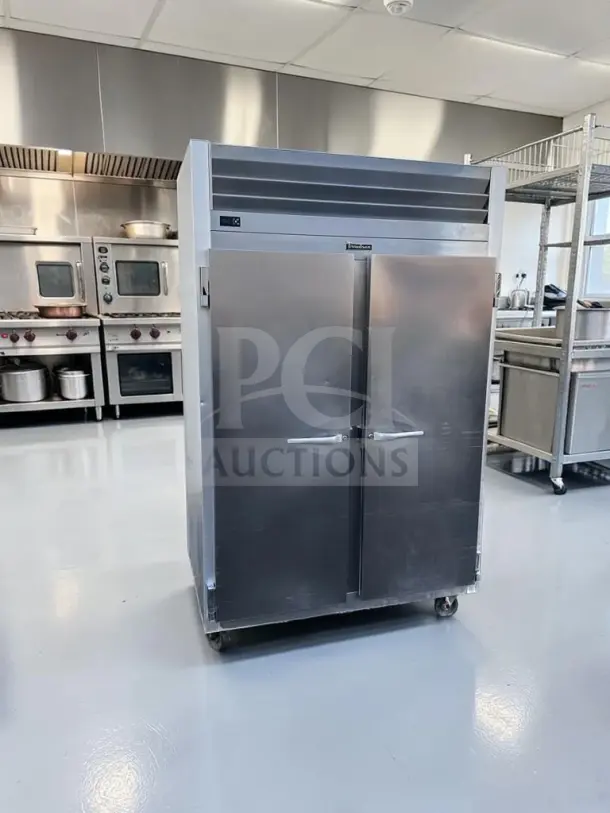 Traulsen G20010 commercial refrigerator, 52.13", two solid doors, 46 cu. ft., excellent condition, fully tested, 115V.