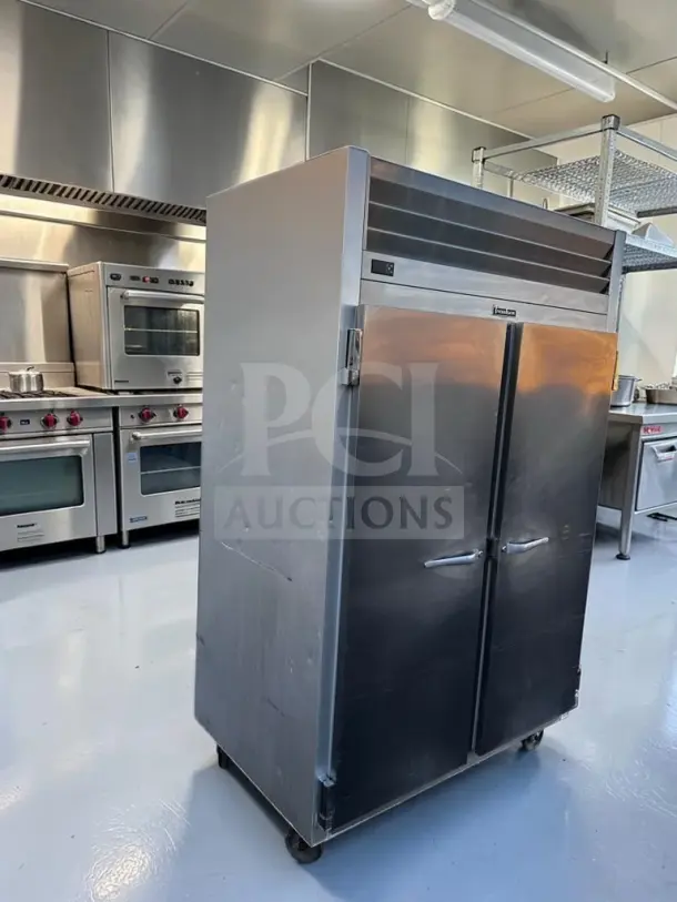 Traulsen G20010 commercial refrigerator, 52.13", two solid doors, excellent condition, 46 cu. ft., fully tested, 115V.