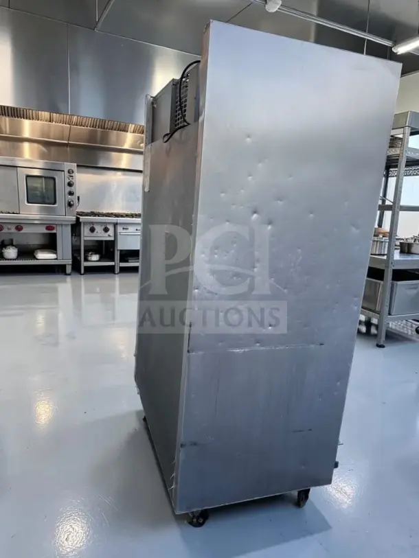 Traulsen G20010 two-section commercial refrigerator, 52.13" wide, 46 cu. ft., two solid doors, excellent condition.