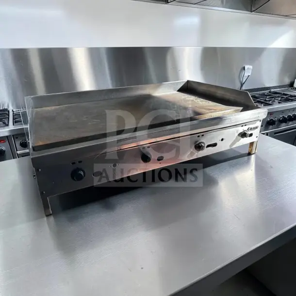 Jade JGT-2448 commercial gas griddle, 48" steel plate, four controls, 120,000 BTU. Excellent condition, fully tested.