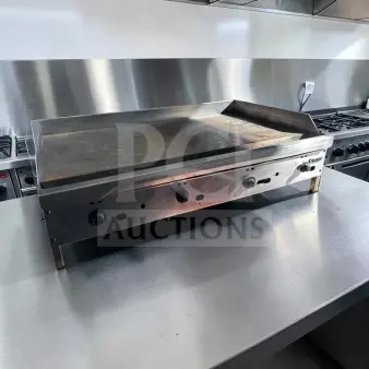 Jade JGT-2448 commercial gas griddle, 48" steel plate, four controls, 120,000 BTU. Excellent condition, fully tested.
