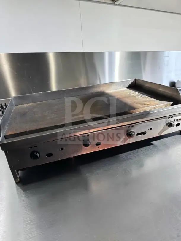 Superior condition Jade JGT-2448 48" gas griddle with 1" steel plate, four controls, 120,000 BTU, fully tested.
