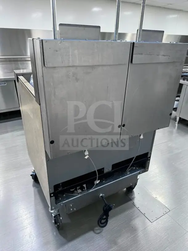 Frymaster 2FQG30U Dual Fryer Battery, natural gas, two 30-lb frypots, SMART4U 3000 controllers, with built-in filtration.