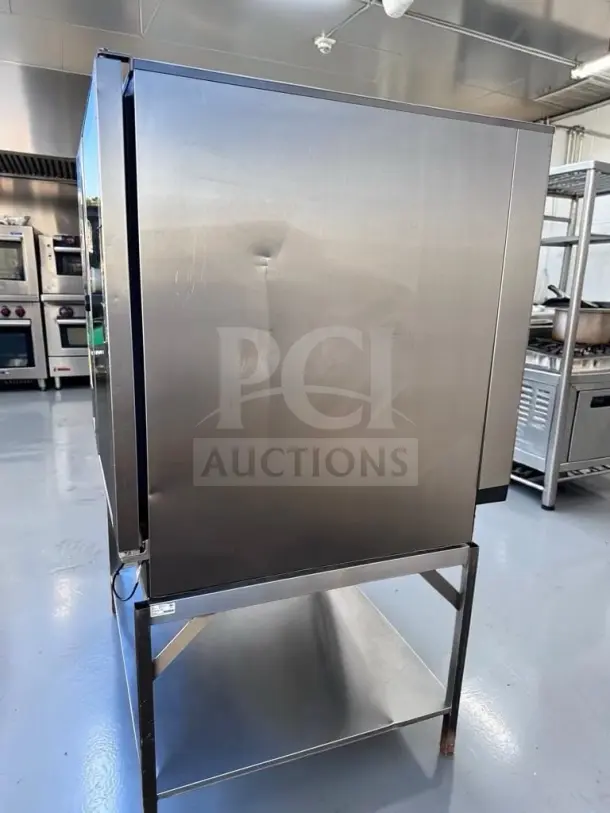 Rational iCombi Pro 10-Full Size Electric combi oven in immaculate condition on stainless steel stand, side view.