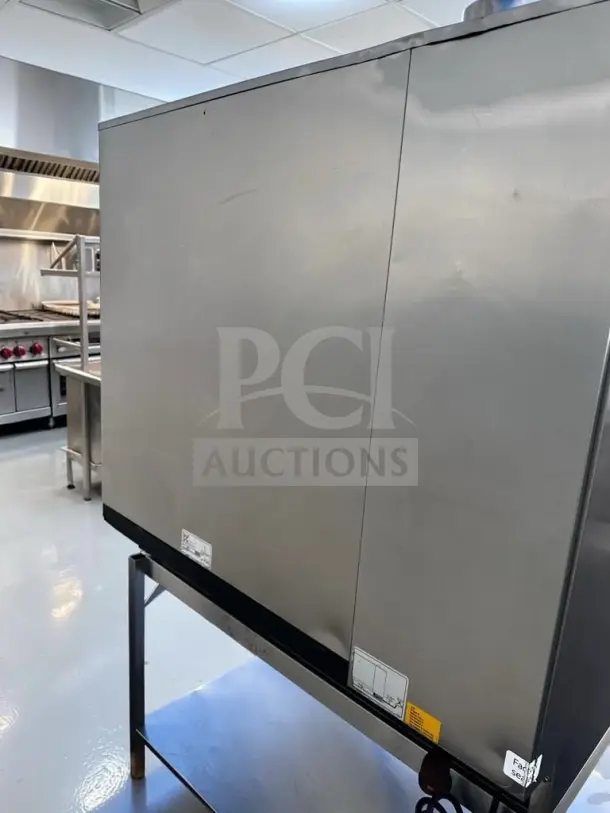 Immaculate Rational iCombi Pro 10-Full Size Electric combi oven on stainless steel stand, fits 10 full-size pans, 208/240V.