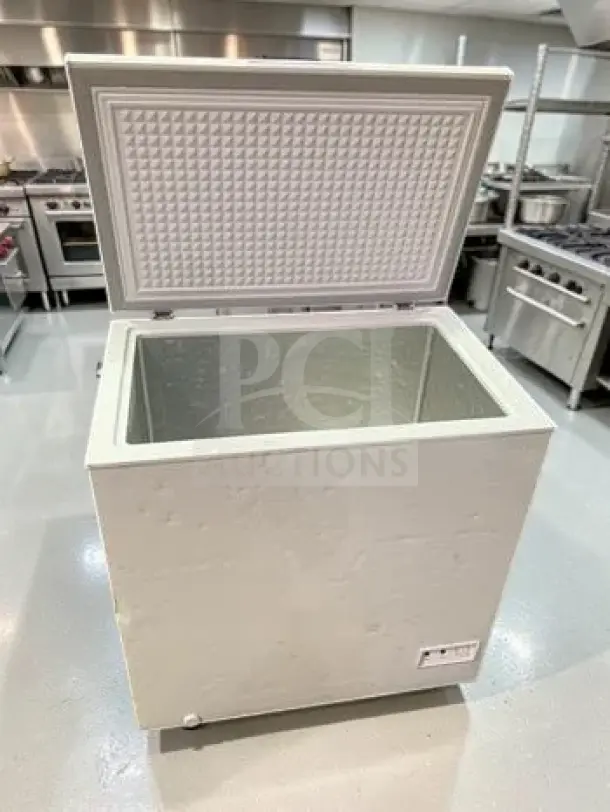 Frigidaire EFRF7003-6COM chest freezer, 32.6" wide, 7.0 cu. ft., garage-ready, adjustable temperature, fully tested.