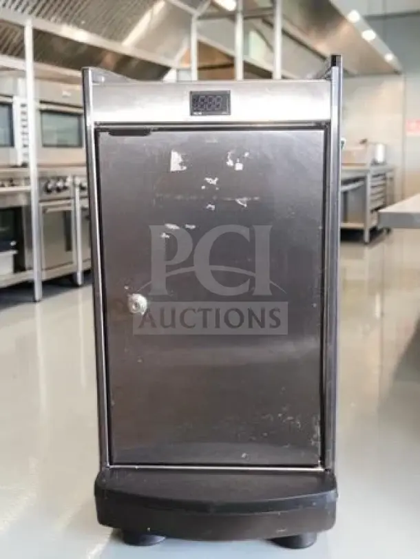 Egro KS9 commercial milk refrigerator, 6.5-liter capacity, integrated pump, level sensor, fully operational, visible wear.