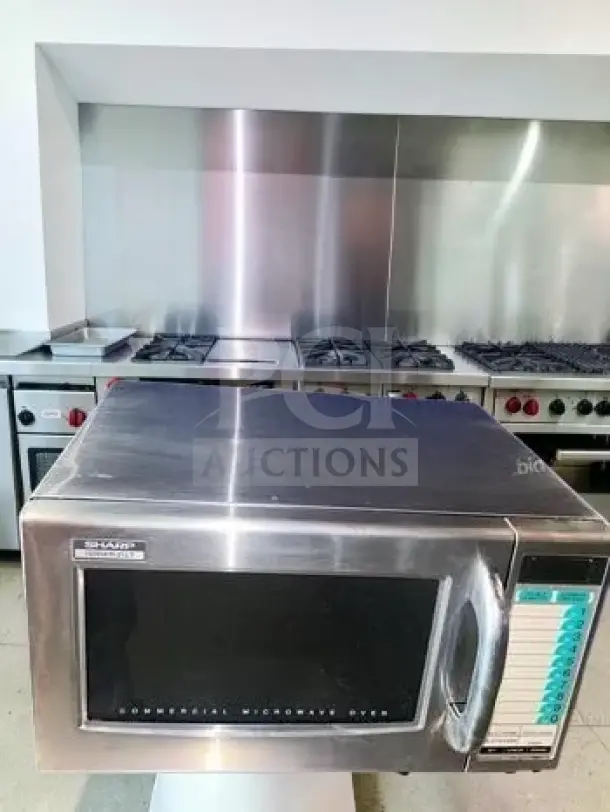 Sharp R-21LTF commercial microwave, 1,000 watts, 1.0 cu. ft., superb condition, touch controls, 120V, NSF listed, fully tested.