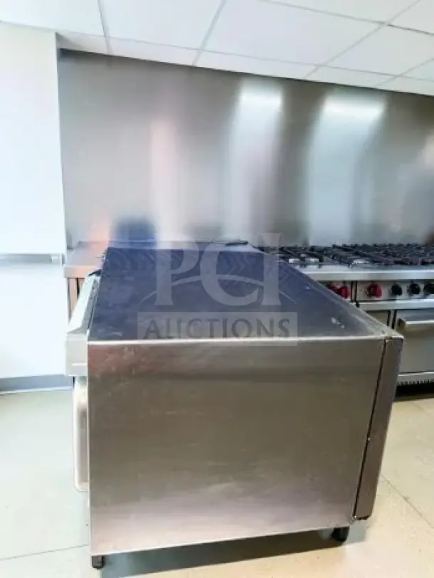 Sharp R-21LTF commercial microwave oven, 1,000 watts, 1.0 cu. ft., touch controls, superb condition, NSF listed, 120V.