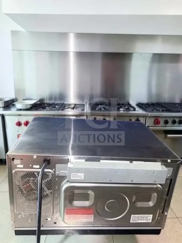 Sharp R-21LTF commercial microwave oven in superb condition, 1,000 watts, 1.0 cu. ft., touch controls, fully tested, NSF listed.