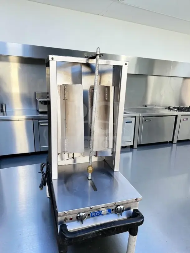 Royal Range RVB-2 commercial two-burner gyro broiler, propane gas, 26,000 BTU, motorized rotisserie, NSF certified, excellent condition.