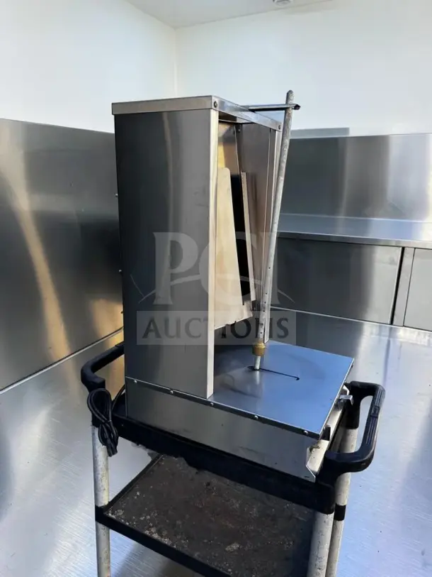 Royal Range RVB-2 vertical gyro broiler, commercial-grade, 26,000 BTU, propane, motorized rotisserie, NSF certified, excellent condition.