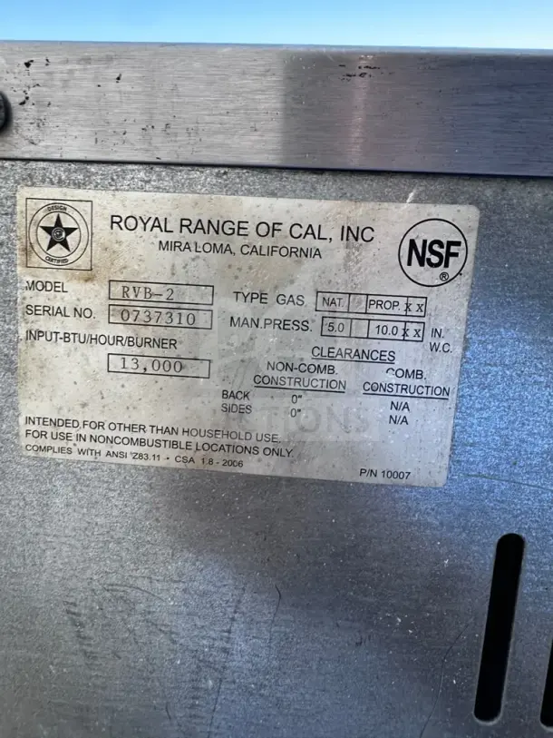 Label on Royal Range RVB-2 gyro broiler, showing model, serial number, gas type, BTU, and NSF certification details.