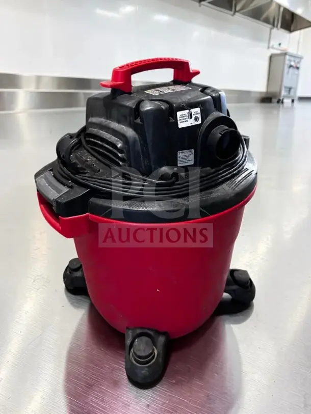 Craftsman CMXEVBE17595 16-gallon wet/dry vacuum in dependable condition with red base, labeled and fully operational.