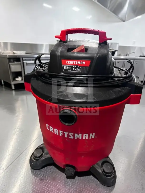 Craftsman CMXEVBE17595 wet/dry vacuum, 16-gallon, 6.5 peak HP, red, heavy-duty, tested, operational, with visible cord wrap.