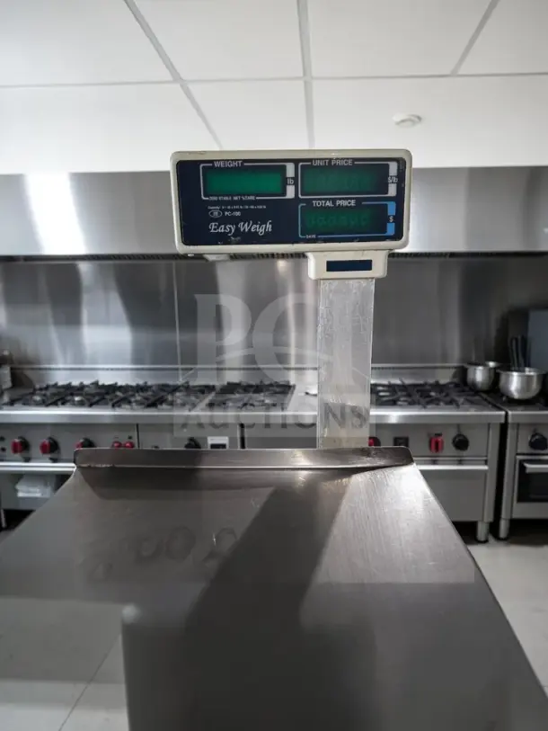 Skyfood PC-100-PL 10" stainless steel price computing scale with pole display, 60 lb capacity, fully tested, 115V.