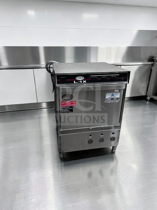 CMA Dishmachines L-1X undercounter dishwasher, 24", stainless steel, low-temp chemical sanitizing, fully tested, excellent condition.
