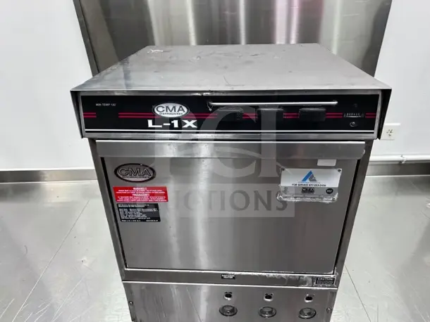 CMA Dishmachines L-1X undercounter dishwasher, 24", low-temp chemical sanitizing, excellent condition, fully tested.