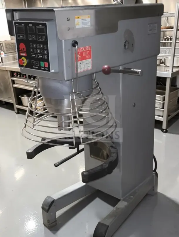 Varimixer W60 60 qt industrial planetary mixer, 220V, heavy-duty floor model. Excellent condition with control panel and safety cage.