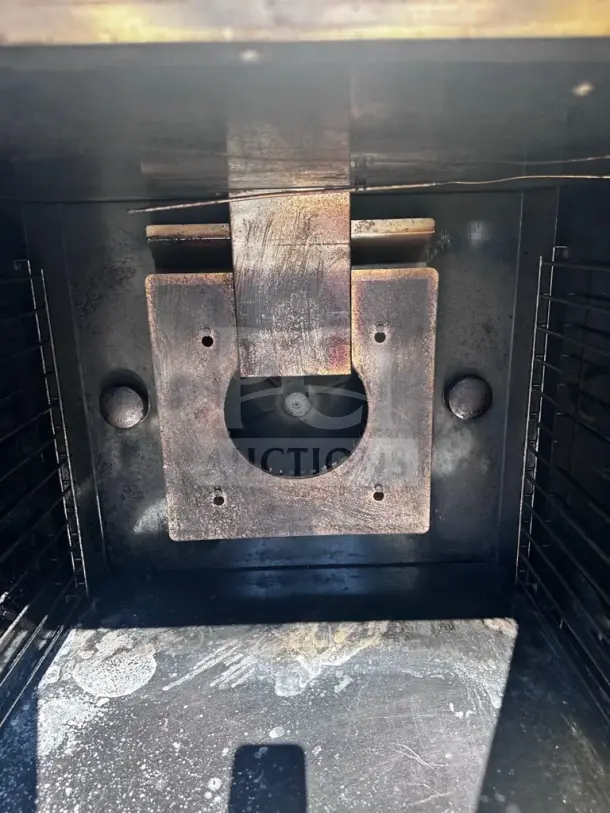Inside view of a Royal Range RCOS-1 natural gas convection oven, showing heating elements and fan in used condition.