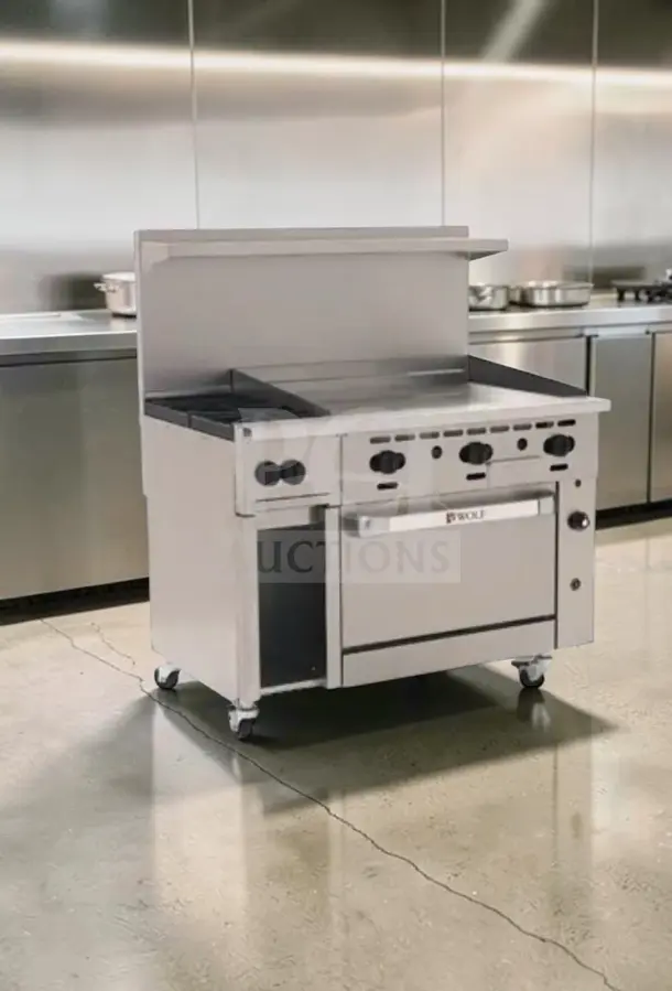 Wolf C48S-2B36G 48" gas range with 2 burners, 36" griddle, oven, and cabinet base. Superior condition, 155,000 BTU.