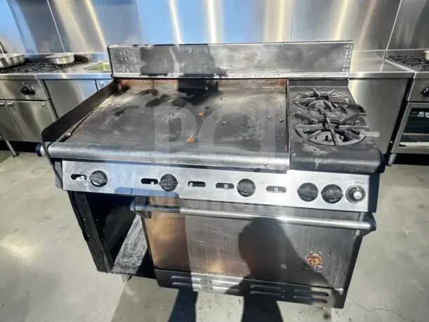 Wolf C48S-2B36G gas range with 2 burners, 36" griddle, oven, cabinet base. Superior condition, 155,000 BTU, fully tested.