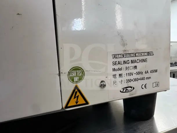 High-Grade Y-Fang Commercial Cup Sealing Machine, 110V, 450W, CE marked, fully tested. Label shows leak test and power specs.
