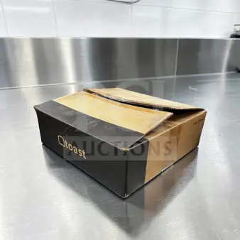 New/Open Box Toast TC200 POS Cash Drawer packaging on a metal surface, showcasing branding.