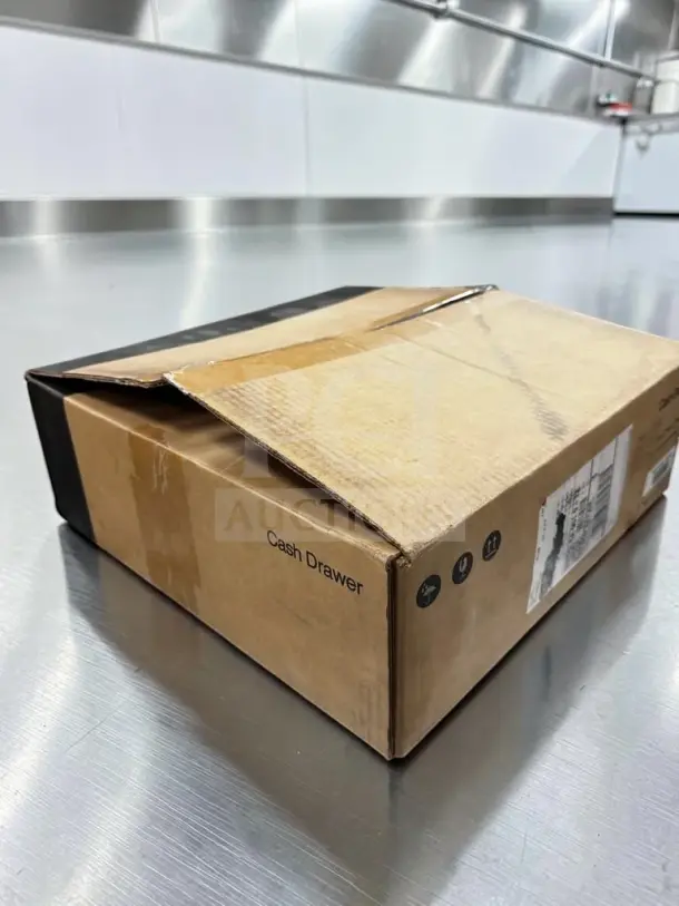 New Toast TC200 commercial black POS cash drawer in open box, lockable with key, removable cash till, printer-driven connection.