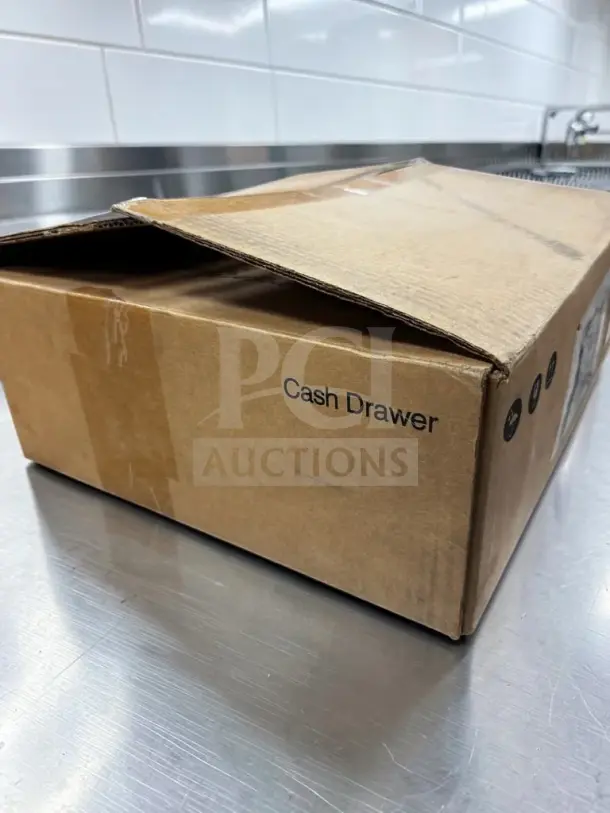 New Toast TC200 commercial POS cash drawer in open box, lockable with key, removable cash till, printer-driven connection.