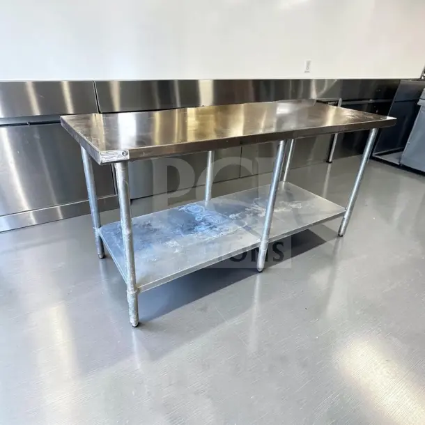 Atlanta Culinary 72" stainless steel work table with adjustable undershelf, galvanized legs, ETL sanitation, NSF compliant.