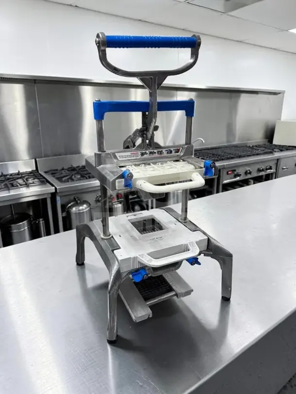 Prince Castle 980-000-00 Saber King slicer, optimal condition, manual operation, blue handles, NSF certified, ready for commercial use.