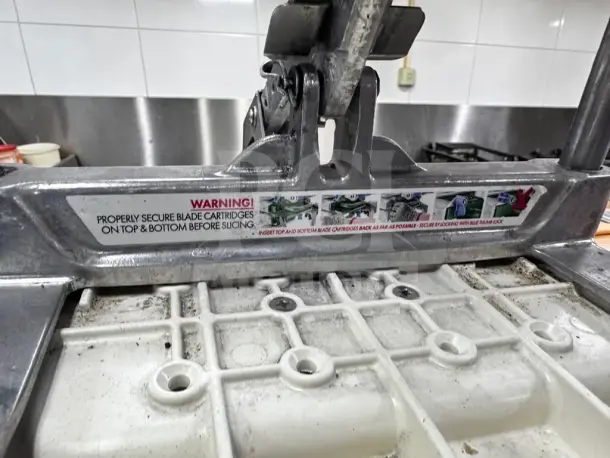 Prince Castle 980-000-00 Saber King slicer, optimal condition, NSF certified, commercial use, caution labels visible.