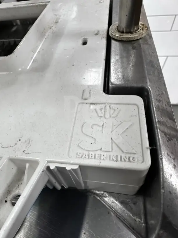 Prince Castle 980-000-00 Saber King manual food slicer; NSF certified, optimal condition, shown in close-up with logo.